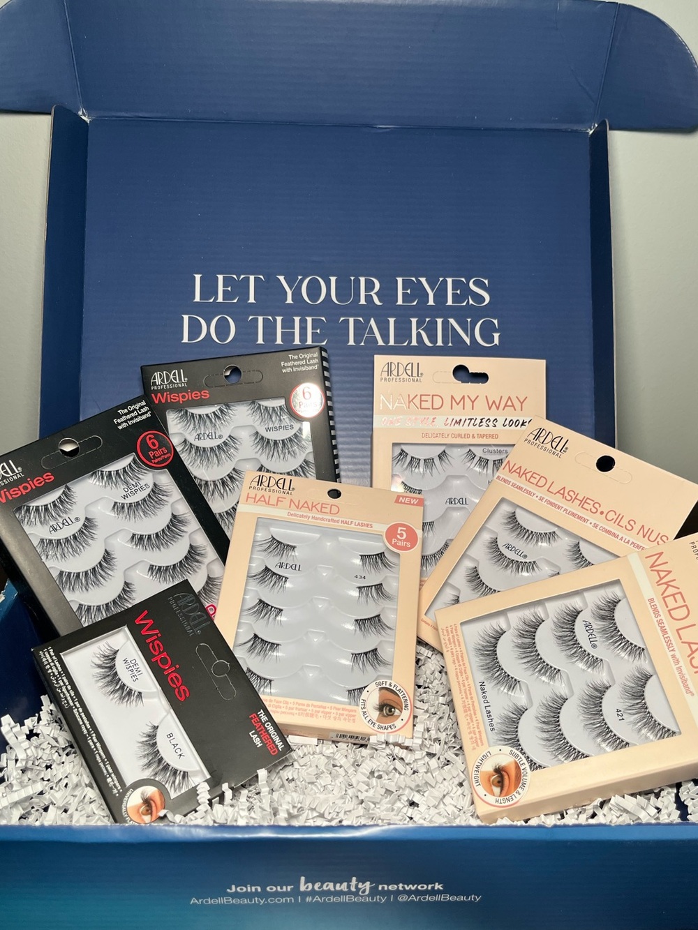 ARDELL 7 bundle boxes of false lashes.